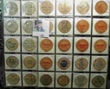 (40) various Wooden Nickels from Iowa in a pair of plastic pages.