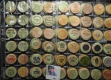 (60) various Wooden Nickels from Iowa in a pair of plastic pages.