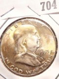 1953 S Franklin Half Dollar, Gem BU with golden obverse toning.