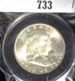1950 Dfranklin Half Dollar with colorful luster in round capsule, BU.