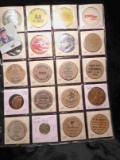 20-Pocket Plastic Page full of Fiber Tokens, Wooden Nickels, and Good Fors. All ready for the show i