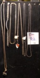 Group of five Antique Necklaces and a Bracelet. Includes a 1968 Senior Pendant on one neclace.