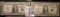 (2) Nice grade Series 1935 E Star Replacement $1 Silver Certificates in plastIc sleeves.