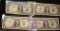 (4) High grade Series 1957B $1 Silver Certificates in plastIc sleeves.
