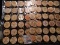 (40) Nebraska Wooden Nickels in a pair of plastic pages.