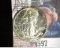 1942 P Walking Liberty Half Dollar Minting error Lamination on obverse at K2-3. Superb Choice AU.