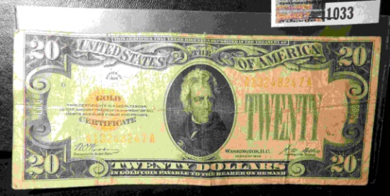 Series 1928 $20 Gold Certificate with yellow seal. Circulated.
