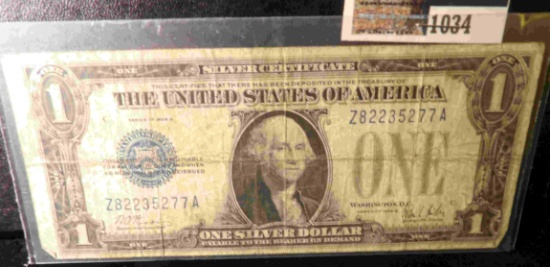 Series 1928B $1 Silver Certificate "Funny Back", circulated.