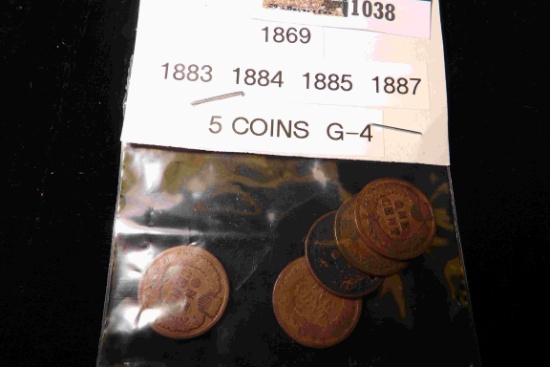 1869 (holed), 1883, 84, 85, & 87 Indian Head Cents. Circulated.