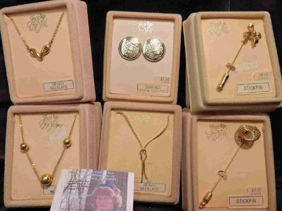 Collection of 6 different necklaces, Earrings, and pins in original Boxes. Retail value was over $30