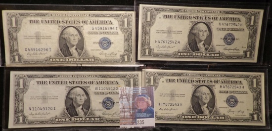 (4) High grade Series 1935 E $1 Silver Certificates in plastIc sleeves.