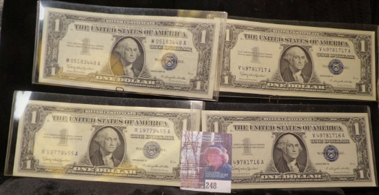 (4) High grade Series 1957B $1 Silver Certificates in plastIc sleeves.
