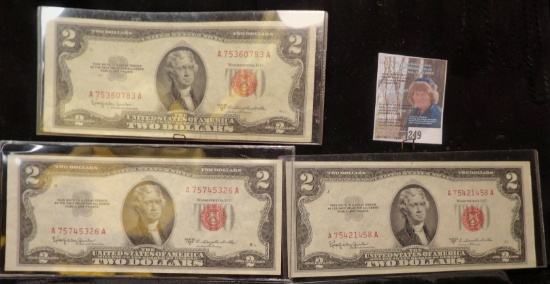 (3) High grade Series 1953C $2 "Red Seal" U.S. Notes in plastic sleeves.