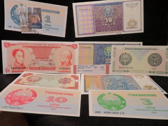 (9) Foreign Banknotes, all high grade. One is a Five Bolivares from the Republic of Venzuela, the ot