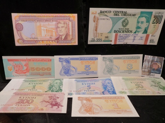 (10) Crisp Uncirculated Foreign Bank Notes. (4) Trans Nistria, (1) Turkmenistan, (4) Ukraine, & (1)