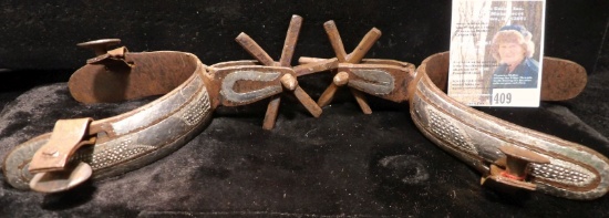 Pair of 1600-1800s Blacksmith made Silvered Overlay Spurs. The rowels have six points each.