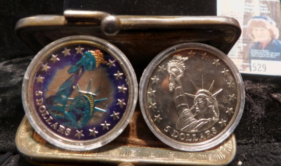 Leather two-pocket Coin purse with a pair of $5 Republic of Liberia Statue of Liberty crowns, one is