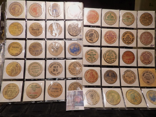 (40) Nebraska Wooden Nickels in a pair of plastic pages.