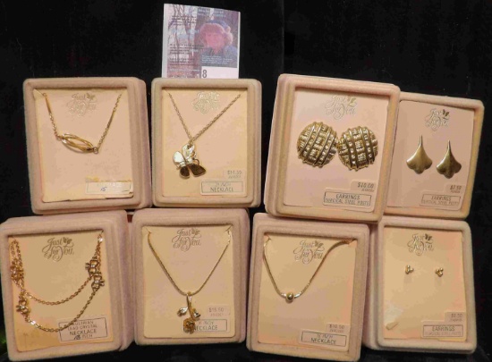 Collection of necklaces and earrings in original Boxes. Retail value was over $60.00.
