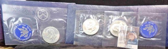 1971 S  (2) 1973-S Silver Eisenhower Dollars in original blue packs as issued. Gem BU.