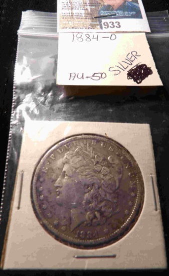 1884 O U.S. Morgan Silver Dollar, carded.