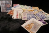 Large Accumulation of Foreign Postage stamps, many of which have not been used.