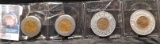 Group of four Lucky Encased Cents. Includes a 1946 Iowa State Fair piece.