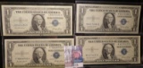 (4) High grade Series 1935 E $1 Silver Certificates in plastIc sleeves.