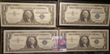 (4) High grade Series 1957 $1 Silver Certificates in plastIc sleeves.