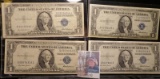 (4) High grade Series 1935 F $1 Silver Certificates in plastIc sleeves.