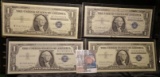 (4) High grade Series 1957A $1 Silver Certificates in plastIc sleeves.