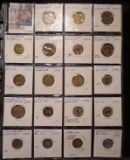 (19) Transportation Tokens in a plastic page. All different.