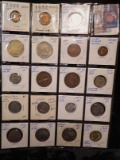 (19) Foreign Coins with a total of .0926 oz. of Silver. All stored in a 20-pocket plastic page.