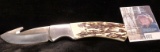 Mossy Oak Stag Horn Fixed Blade knife with gut hool. Like new.