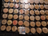 (40) Nebraska Wooden Nickels in a pair of plastic pages.
