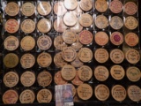 (40) Nebraska Wooden Nickels in a pair of plastic pages.