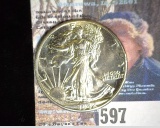 1942 P Walking Liberty Half Dollar Minting error Lamination on obverse at K2-3. Superb Choice AU.