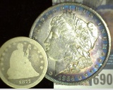 1877 S U.S. Seated Liberty Quarter & 1884 O High grade Morgan Silver Dollar with lovely toning.