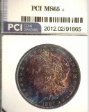 1887 P Morgan Silver Dollar slabbbed PCI MS65+. Attractive obverse toning.