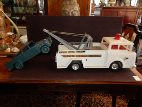 Vintage Marx "Big Bruiser" wrecker truck with truck with flat tire, cond G played with, missing cran