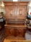 Massive antique hunter's cabinet, with center plate rack, pillared supported design, cond G-VG, cann