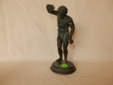 Small antique / vintage? Bronze? / cast metal sculpture depicting nude man with items in hands, mark