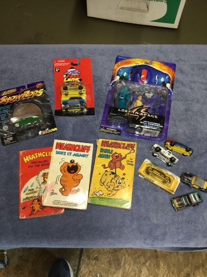 Vintage box of toys to include lost in space figures diecast cars and books