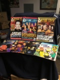 Stack of Star Trek magazine and book with record at