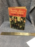 Vintage cherry Ames army nurse by Helen Wells with paper cover