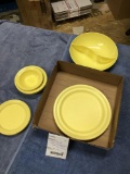 Vintage box of yellow harmony house Melmac dinnerware