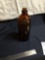 Vintage tall brown Pure X bottle