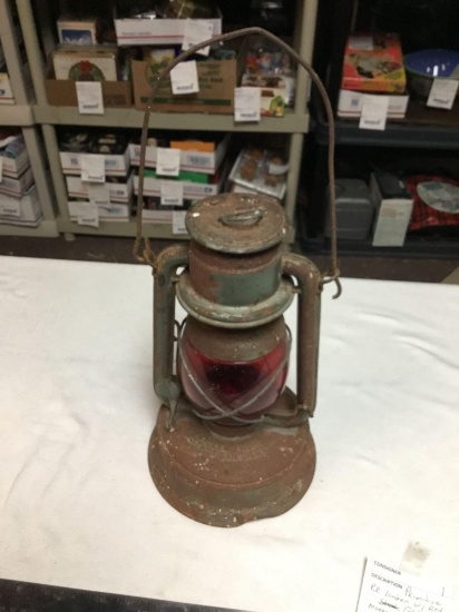 primitive railroad lantern with red globe mart stolen from city of San Diego