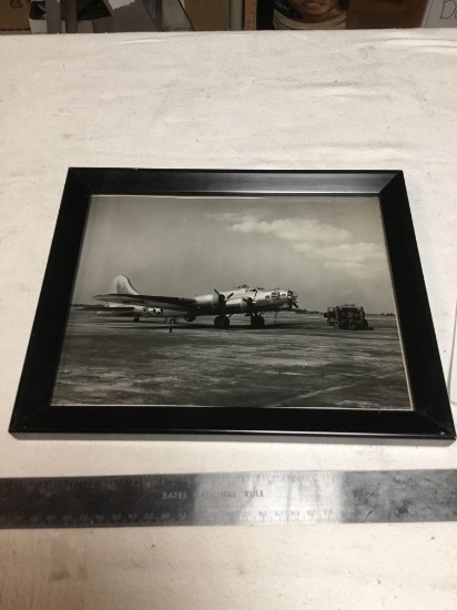 vintage black and white photo of World War II bomber framed
