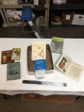 box of various antique recipe books and other paper goods